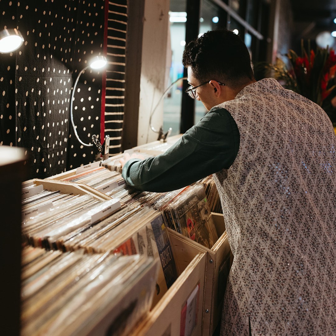 Digging through vinyl crates at The SoundBar on Automobile Alley